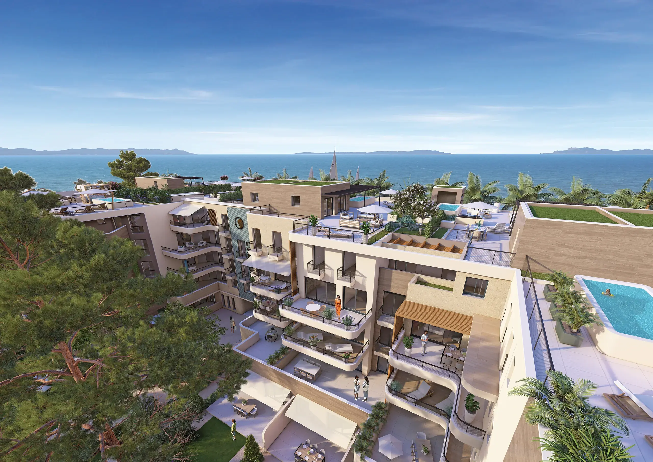 Vue aérienne des terrasses et rooftops face à la mer et aux îles