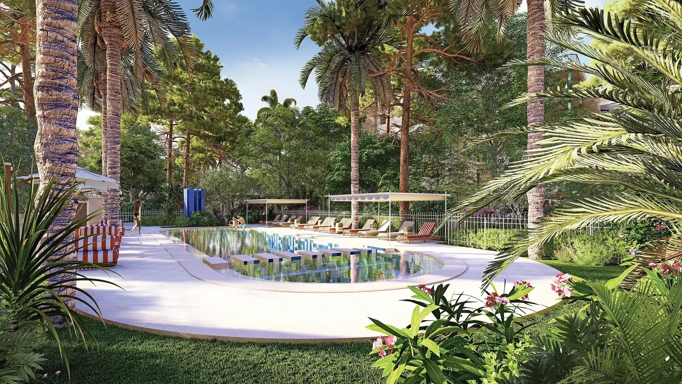 La piscine du Domaine au cœur des pins et des palmiers